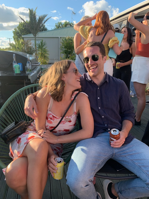 Sitting together at a garden party at sunset